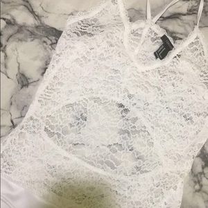 White lace bodysuit cut out in the back